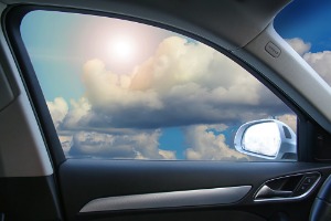 View of a sun behind clouds looking through an Electric Window in Geneseo IL