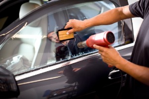 Technician performing Electric Window Repair in Geneseo IL
